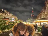two girls standing in the city