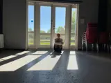 Girl sitting by the window